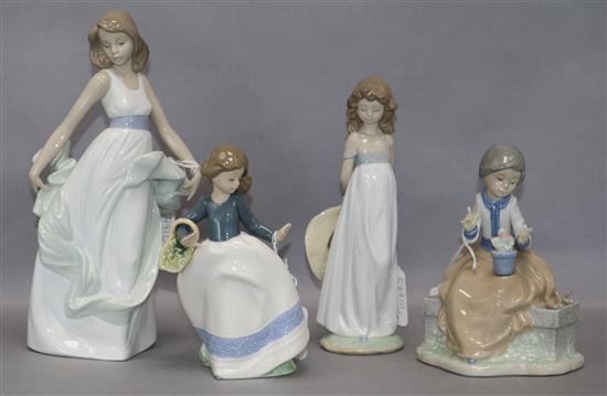 A Lladro figure of a girl with a hat and three small Nao figures of girls tallest 27cm (4)